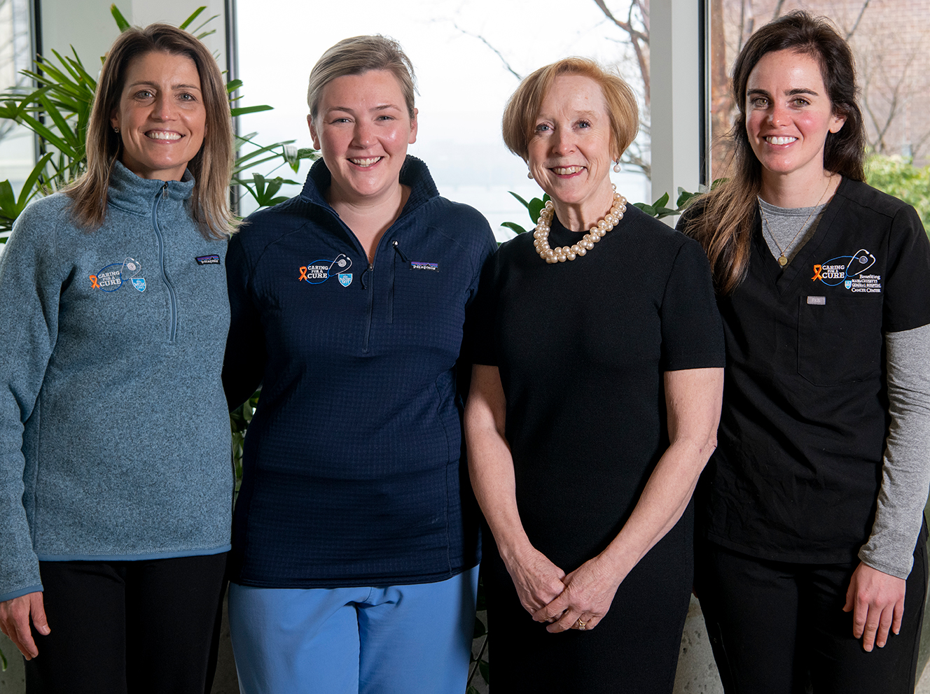 Pictured here with Debbie Burke, RN, DNP, MBA, NEA-BC, senior vice president for patient care and chief nurse at Mass General (2nd from right), are (from left) Caring For A Cure founders and co-directors, Molly Higgins, RN, Laura White, RN and Christine Weiand, RN