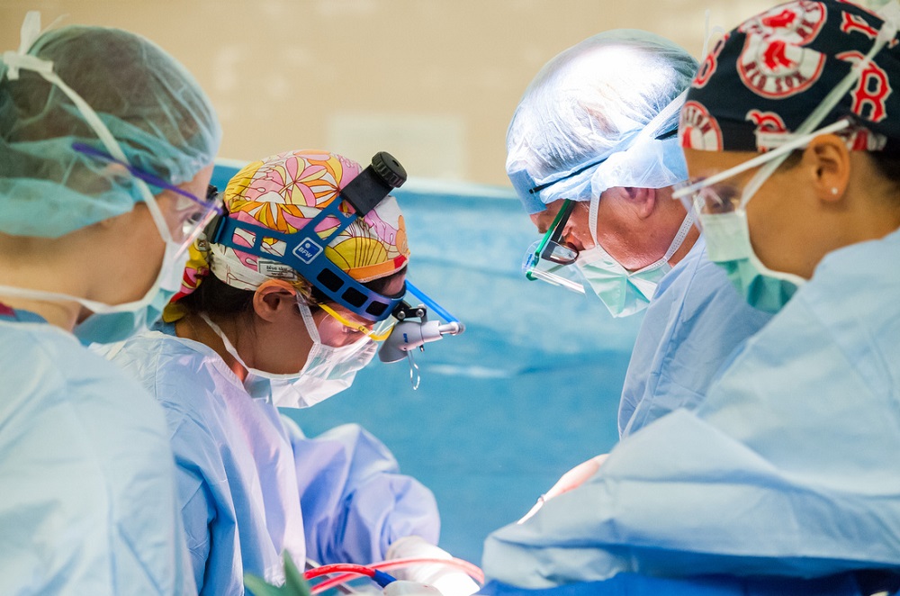 Doctors performing surgery at Mass General