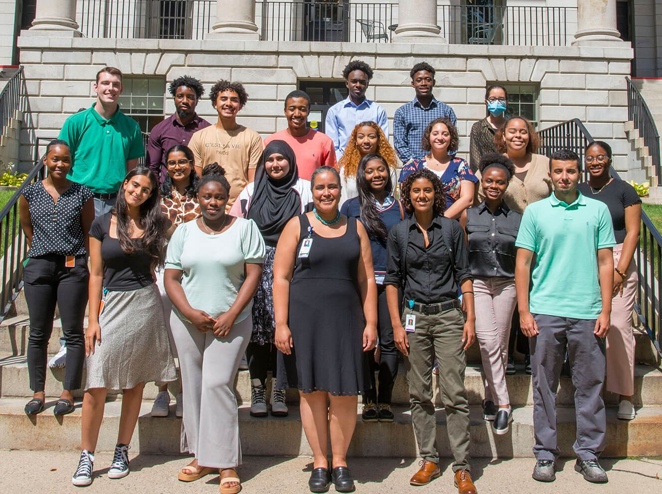 Youth Neurology Education and Research Program director Dr. Nicte Mejia, MD (front center), with high school and undergraduate student interns who spent the summer working and learning alongside neuroscientists at Mass General.
